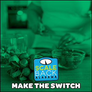 Image of a person cutting up tomatoes for a salad