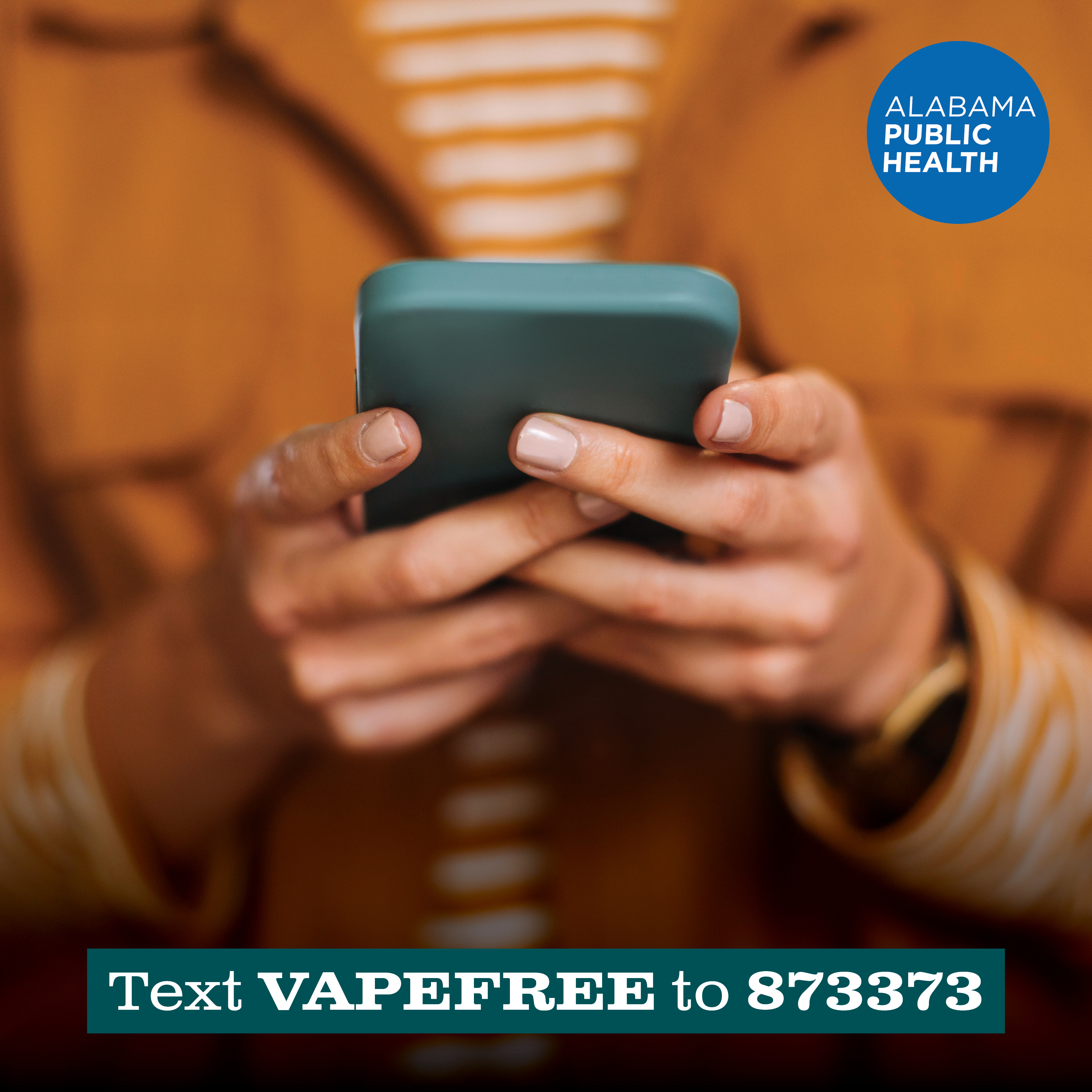 photo of a person holding a phone. Text VAPEFREE to 873373